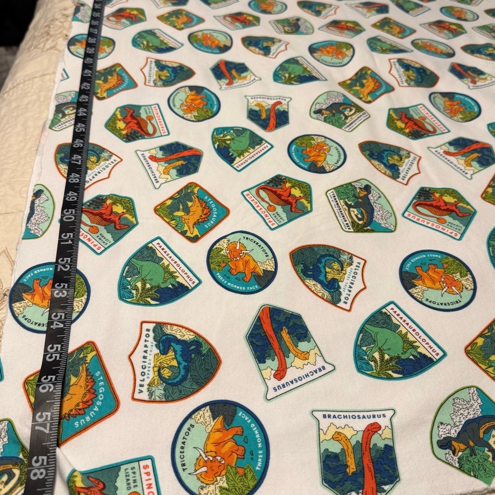 🦕 Jersey Knit Fabric – Dino Badges Print – 60x60” 🧵 - Picture 3 of 4
